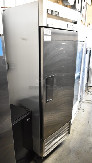 True T-23F Stainless Steel Commercial Single Door Reach In Freezer w/ Poly Coated Racks on Commercial Casters. 115 Volts, 1 Phase. Tested and Working!