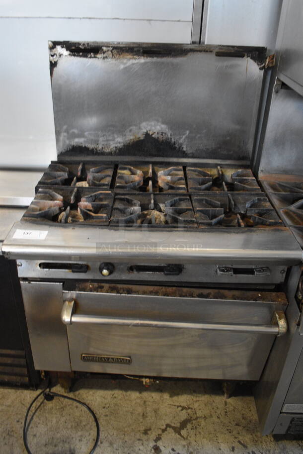 American Range Commercial Stainless Steel Natural Gas 6 Range Burner With Oven On Galvanized Legs.