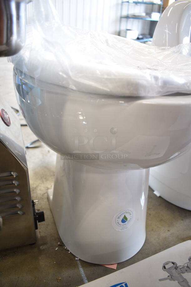 BRAND NEW SCRATCH AND DENT! White Toilet w/ Zurn Z5955SS-EL Toilet Seat and Zurn Flush Valve.  - Image 4 of 8