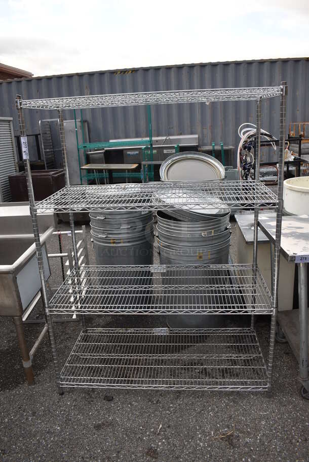 Chrome Finish 4 Tier Wire Shelving Unit. BUYER MUST DISMANTLE. PCI CANNOT DISMANTLE FOR SHIPPING. PLEASE CONSIDER FREIGHT CHARGES. 48x24x65