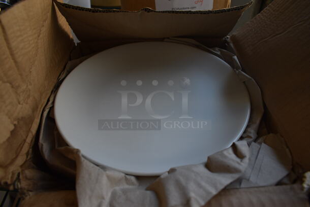 12 BRAND NEW IN BOX! White ceramic Plates. 8.5x8.5x1. 12 Times Your Bid!