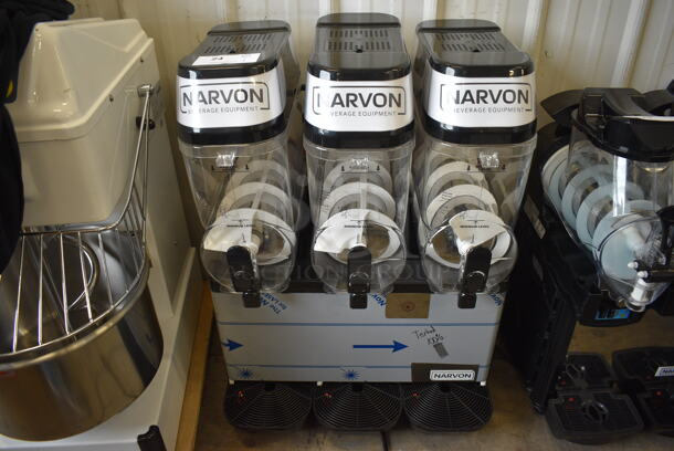 BRAND NEW! Narvon Model 378SM3 Metal Commercial Countertop 3 Hopper Slushie Machine. Each Hopper Has 3 Gallon Capacity. 120 Volts, 1 Phase. 24x20x29. Tested and Working!