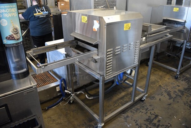 Belshaw Adamatic Model TG50 Stainless Steel Commercial Floor Style Thermoglaze Icing Machine on Commercial Casters. 208 Volts, 1 Phase. 80x33.5x54.5.