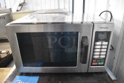 2017 Panasonic NE-1054F T Metal Countertop Microwave Oven. 120 Volts, 1 Phase. 20x13x11