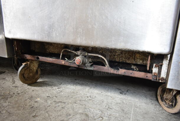 Imperial Stainless Steel Commercial Natural Gas Powered 6 Burner Range w/ Oven and Back Splash on Commercial Casters. - Image 5 of 6