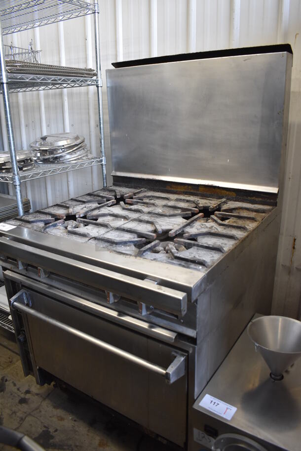 Jade Range Stainless Steel Commercial Natural Gas Powered 4 Burner Range w/ Oven and Back Splash on Commercial Casters. 36x38x63