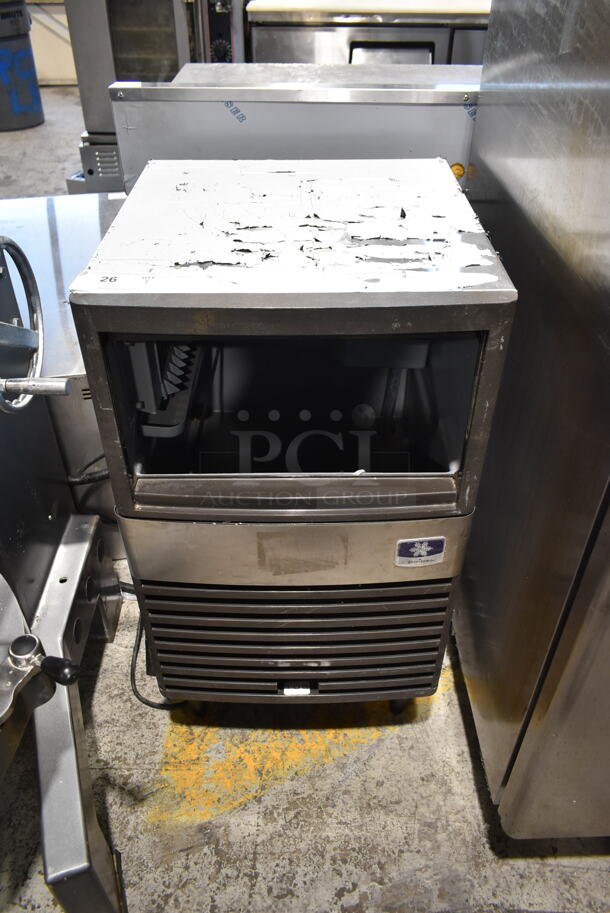 2017 Manitowoc QM30A Stainless Steel Commercial Self Contained Undercounter Ice Machine. Lid Is Stuck In Track. 115 Volts, 1 Phase.