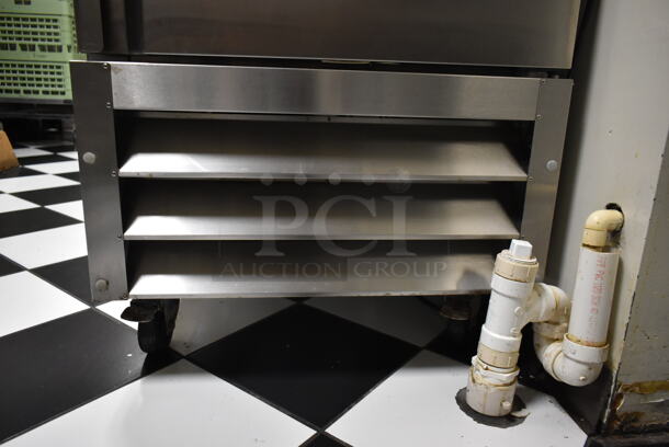Entree CR1 Stainless Steel Commercial Single Door Reach In Cooler w/ Poly Coated Racks on Commercial Casters. 115 Volts, 1 Phase. Tested and Working! (ice room) - Image 5 of 7