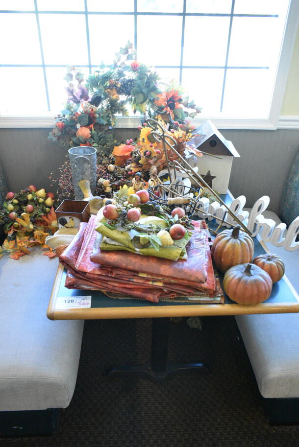 Wall Mount Table w/ Contents Including Fall Decor. BUYER MUST REMOVE: Bring Tools and Manpower Needed To Remove This Item. (booth room)  - Image 1 of 10