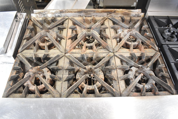 Vulcan V6B36S Stainless Steel Commercial Natural Gas Powered 6 Burner Range w/ Oven on Commercial Casters.  - Image 2 of 6