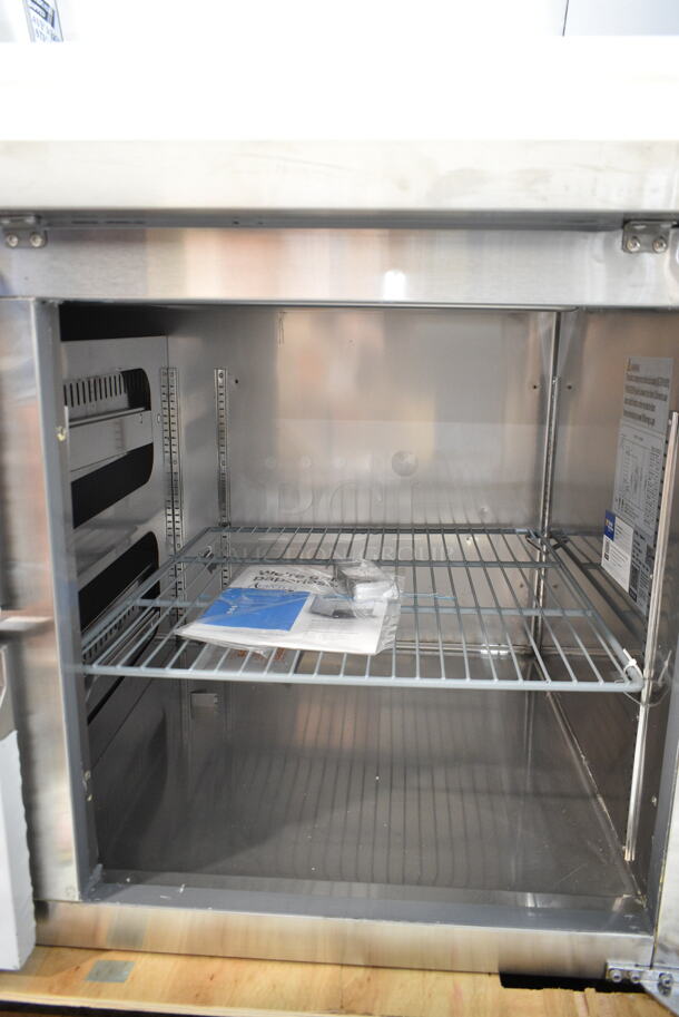 BRAND NEW SCRATCH AND DENT! 2024 Avantco 178SSPPT2 Stainless Steel Commercial Prep Table w/ Over Sized Cutting Board and 2 Drawers. Missing Door. 115 Volts, 1 Phase. Tested and Powers On But Does Not Get Cold  - Image 5 of 8