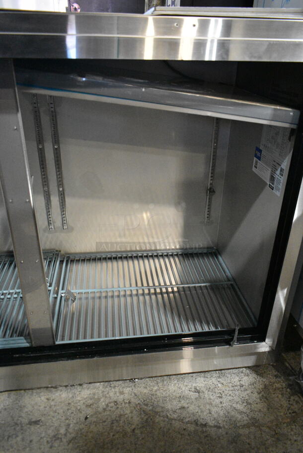 BRAND NEW SCRATCH AND DENT! 2024 Avantco 178UBB60SGTS 60" Stainless Steel Underbar Height Narrow Sliding Glass Door Back Bar Refrigerator with Galvanized Top and LED Lighting. Missing Doors. 115 Volts, 1 Phase. Cannot Test Due To Missing Power Components - Image 6 of 8