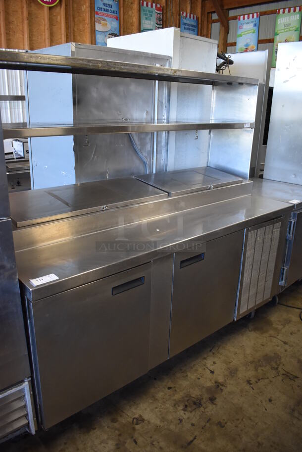 Delfield Stainless Steel Commercial Pizza Prep Table w/ 2 Tier Over Shelf on Commercial Casters. Missing 1 Caster. 115 Volts, 1 Phase. 76x32x69. Cannot Test - Unit Trips Breaker - Image 1 of 10