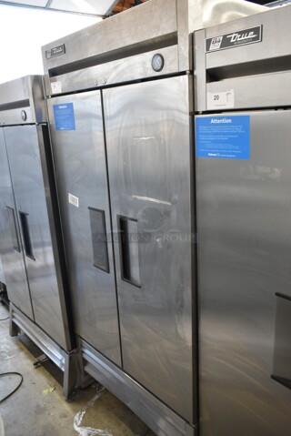 2017 True T-35 Stainless Steel Commercial 2 Door Reach In Cooler w/ Poly Coated Racks on Commercial Casters. 115 Volts, 1 Phase. Tested and Powers On But Does Not Get Cold