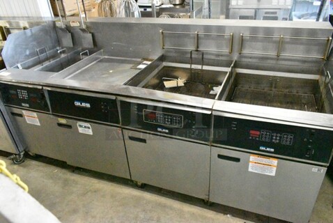 Giles EOF-10-10 Stainless Steel Commercial Electric Powered 3 Bay Fryer w/ Dumping Station on Commercial Casters. 480 Volts, 3 Phase.