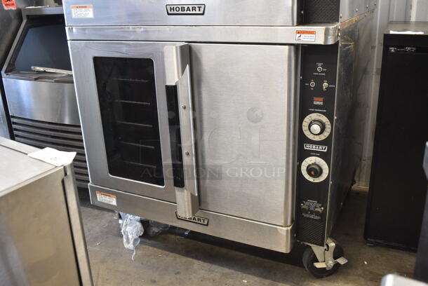 2 Hobart Stainless Steel Commercial Electric Powered Full Size Convection Oven w/ View Through Door, Solid Door, Metal Oven Racks and Thermostatic Controls on Commercial Casters. 208-240 Volts, 1/3 Phase. 2 Times Your Bid! - Image 3 of 9