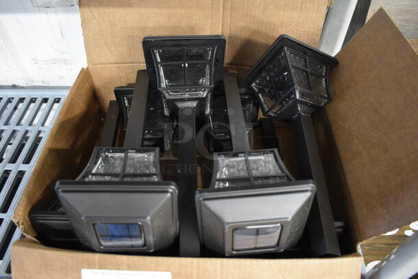 9 Black Solar Powered Path Lights. Almost All Units Are BRAND NEW, Others Are Lightly Used. 5x5x12.5. 9 Times Your Bid! - Image 1 of 4