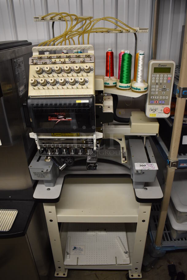 Expert AD860 Metal Commercial Floor Style Embroidery Machine on Commercial Casters w/ 2 Tiers Worth of Extra Parts. Includes 26x30x64 - Image 1 of 12