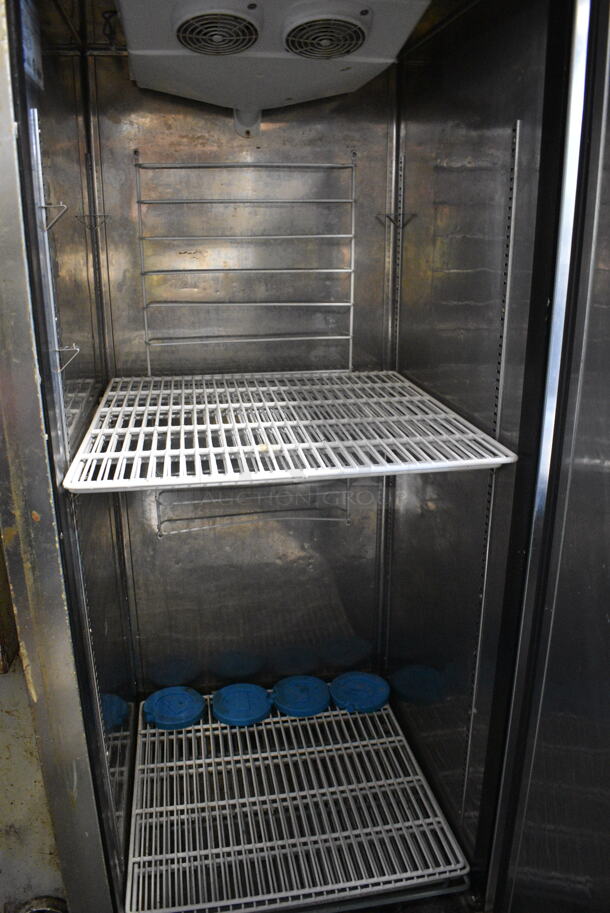 Everest ESF1 Stainless Steel Commercial Single Door Reach In Freezer w/ Poly Coated Racks on Commercial Casters. 115 Volts, 1 Phase. Tested and Powers On But Does Not Get Cold - Image 3 of 4