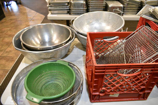 ALL ONE MONEY! Lot of Various Items Including Stainless Steel Drop In Bin Lids, Sifter, Colanders, Bowls, Poly Lids. Does Not Include Table. (main dining room) - Image 2 of 4
