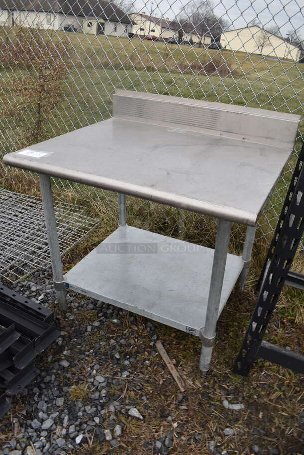 Stainless Steel Table w/ Back Splash and Under Shelf. 36x30x37 - Image 3 of 4