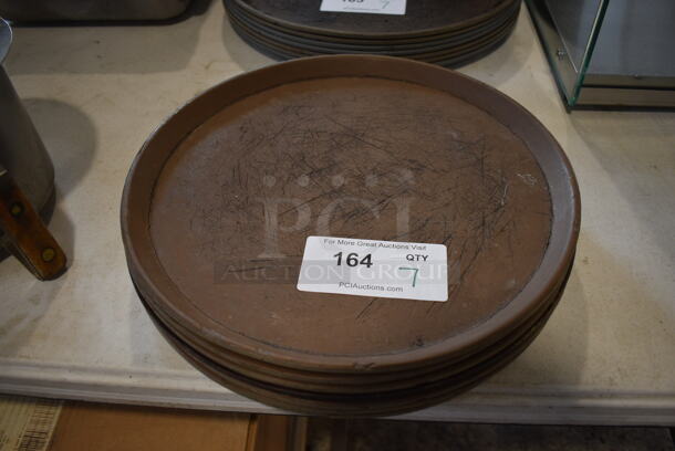 7 Round Serving Trays. 14x14x1. 7 Times Your Bid!