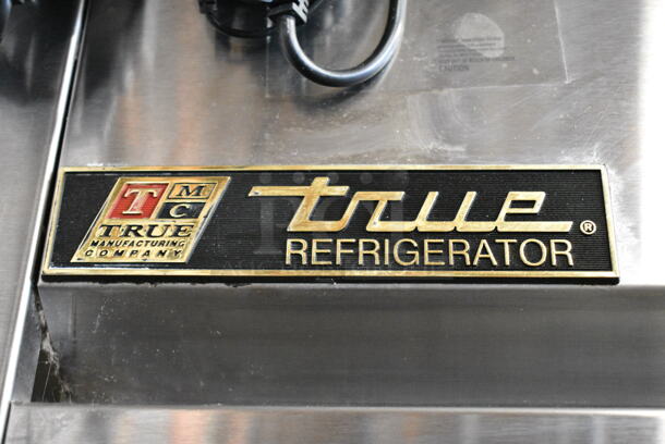 True TG2R-2S ENERGY STAR Stainless Steel Commercial 2 Door Reach In Cooler w/ Poly Coated Racks on Commercial Casters. 115 Volts, 1 Phase. Tested and Powers On But Does Not Get Cold - Image 2 of 6