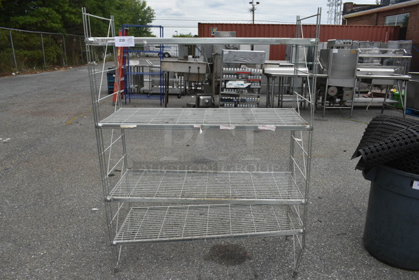 Chrome Finish 4 Tier Wire Shelving Unit. BUYER MUST DISMANTLE. PCI CANNOT DISMANTLE FOR SHIPPING. PLEASE CONSIDER FREIGHT CHARGES. - Image 1 of 4