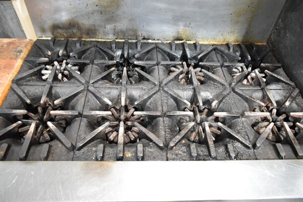 Garland Stainless Steel Commercial Natural Gas Powered 8 Burner Range w/ Convection Oven, Over Shelf and Back Splash.  - Image 3 of 5