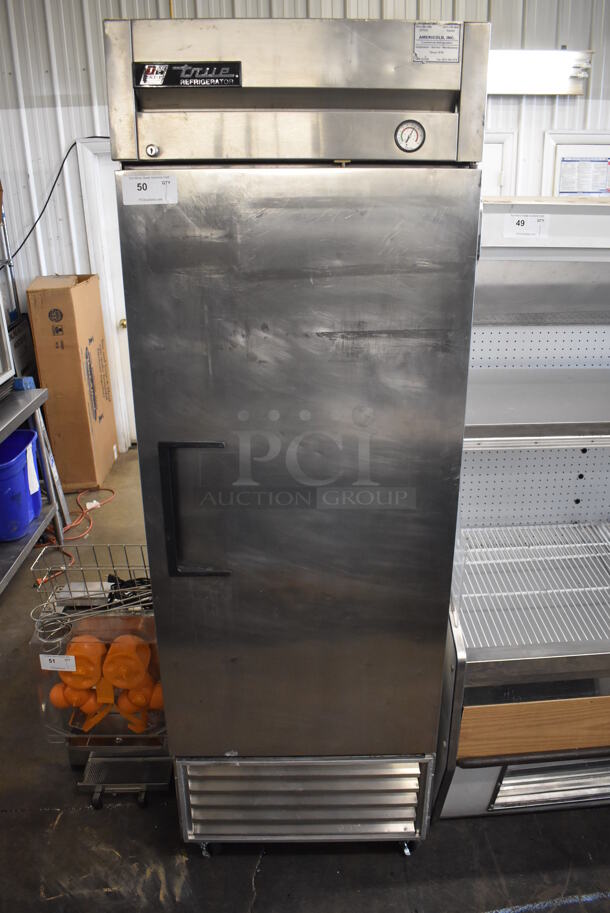 True T-23 Stainless Steel Commercial Single Door Reach In Cooler on Commercial Casters. 115 Volts, 1 Phase. 27x30x82. Tested and Powers On But Temps at 49 Degrees - Image 1 of 5
