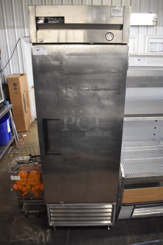 True T-23 Stainless Steel Commercial Single Door Reach In Cooler on Commercial Casters. 115 Volts, 1 Phase. 27x30x82. Tested and Powers On But Temps at 49 Degrees