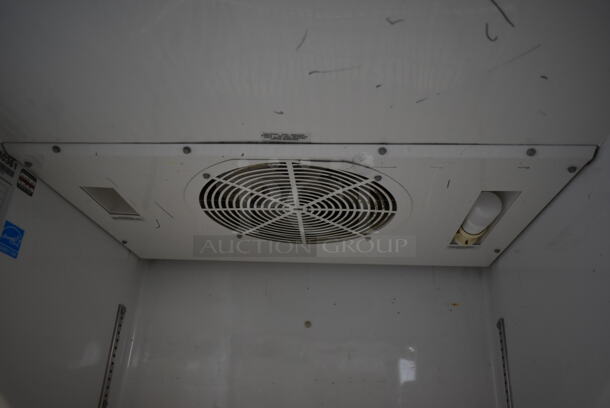 2015 True TG1R-1S ENERGY STAR Stainless Steel Commercial Single Door Reach In Cooler w/ Poly Coated Racks on Commercial Casters. 115 Volts, 1 Phase. Tested and Working! - Image 6 of 7