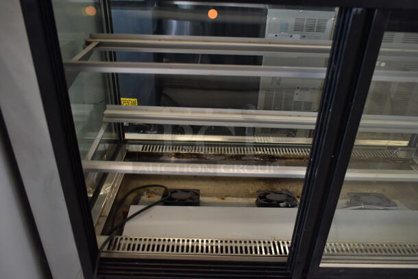 Stainless Steel Commercial Floor Style Deli Display Case Merchandiser. See Picture For Crack on Side Pane. Tested and Powers On But Does Not Get Cold - Image 6 of 7