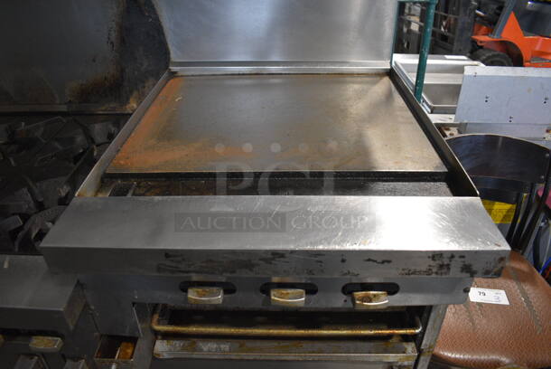 Garland SunFire Stainless Steel Commercial Natural Gas Powered 6 Burner Range w/ Flat Top Griddle, 2 Ovens, Over Shelf and Back Splash on Commercial Casters. 61x33x60 - Image 2 of 8