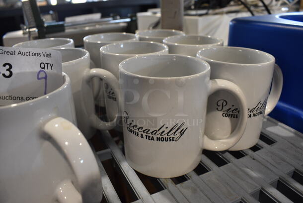 9 White Ceramic Mugs. 5.25x3.25x3.75. 9 Times Your Bid!