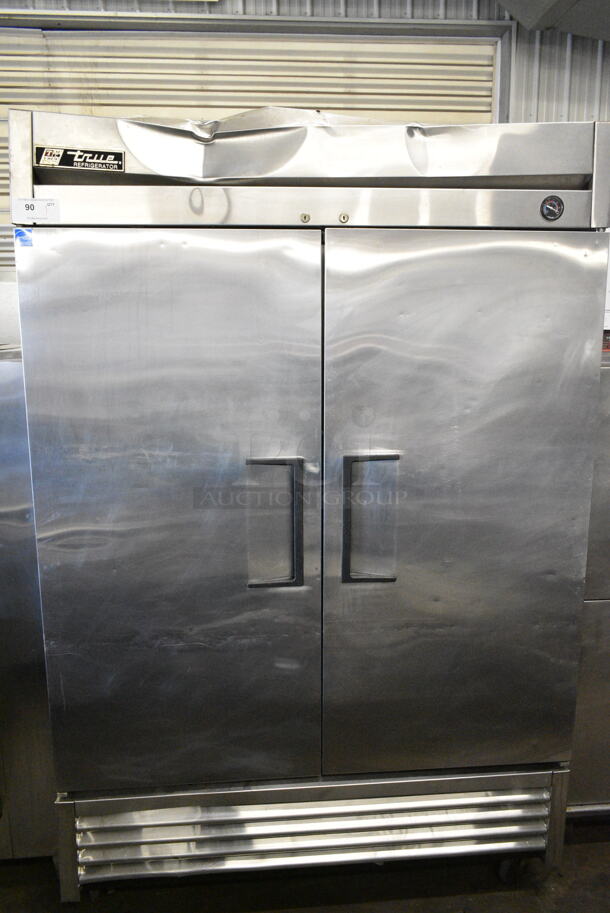 True T-49 ENERGY STAR Stainless Steel Commercial 2 Door Reach In Cooler w/ Poly Coated Racks on Commercial Casters. 115 Volts, 1 Phase. Tested and Working! - Image 1 of 6