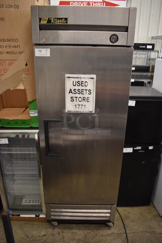 2015 True T-19F Stainless Steel Commercial Single Door Reach In Freezer w/ Poly Coated Racks on Commercial Casters. 115 Volts, 1 Phase. 27x24x79. Tested and Working!