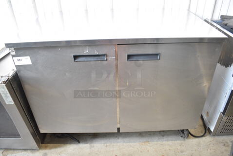 Delfield UC4048-STAR Stainless Steel Commercial 2 Door Undercounter Cooler on Commercial Casters. 115 Volts, 1 Phase. Tested and Powers On But Does Not Get Cold