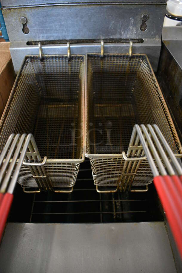 Pitco Frialator 14 Stainless Steel Commercial Floor Style Natural Gas Powered Deep Fat Fryer w/ 2 Metal Fry Baskets on Commercial Casters. 110,000 BTU. 15.5x30x50 - Image 5 of 8