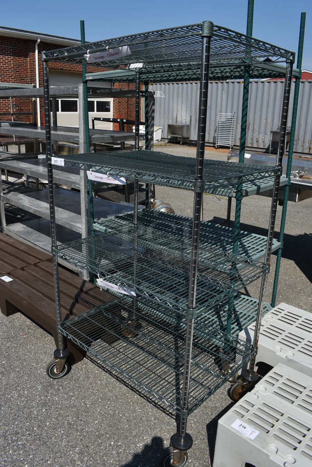 Metro 4 Tier Wire Shelving Unit on Commercial Casters. BUYER MUST DISMANTLE. PCI CANNOT DISMANTLE FOR SHIPPING. PLEASE CONSIDER FREIGHT CHARGES. 36x24x68