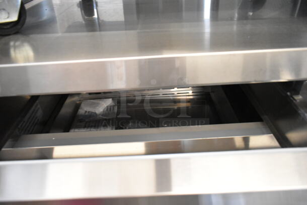 BRAND NEW SCRATCH AND DENT! 2023 Avantco 178CBE72HC Stainless Steel Commercial 4 Drawer Chef Base on Commercial Casters. 115 Volts, 1 Phase. Tested and Working! - Image 5 of 9