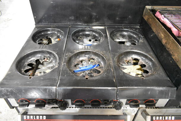 Garland Metal Commercial Natural Gas Powered 6 Burner Range w/ Flat Top Griddle, 2 Ovens, Back Splash and Over Shelf on Commercial Casters.  - Image 6 of 11