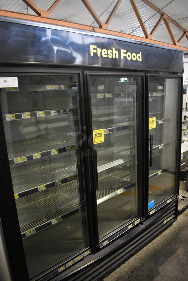 True GDM-72 Commercial Reach In Floor Style Triple Swing Glass Door Merchandiser Cooler In Black With Polycoated Racks. 115V/ 1 Phase Tested And Working - Image 1 of 7