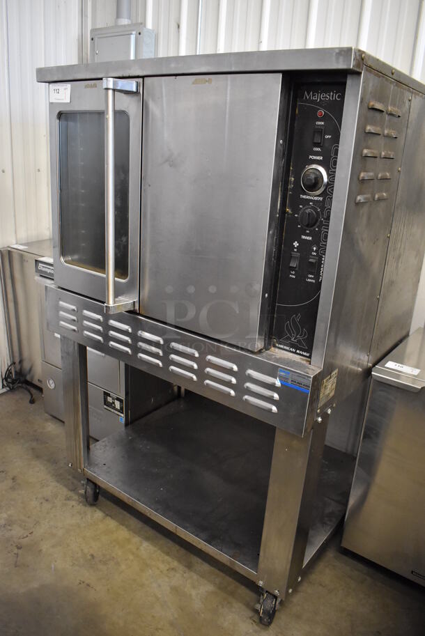 American Range Majestic M-1-GL Stainless Steel Commercial Propane Gas Powered Full Size Convection Oven w/ View Through Door, Solid Door, Thermostatic Controls and Under Shelf on Commercial Casters. 45,000 BTU. 40x34x64
