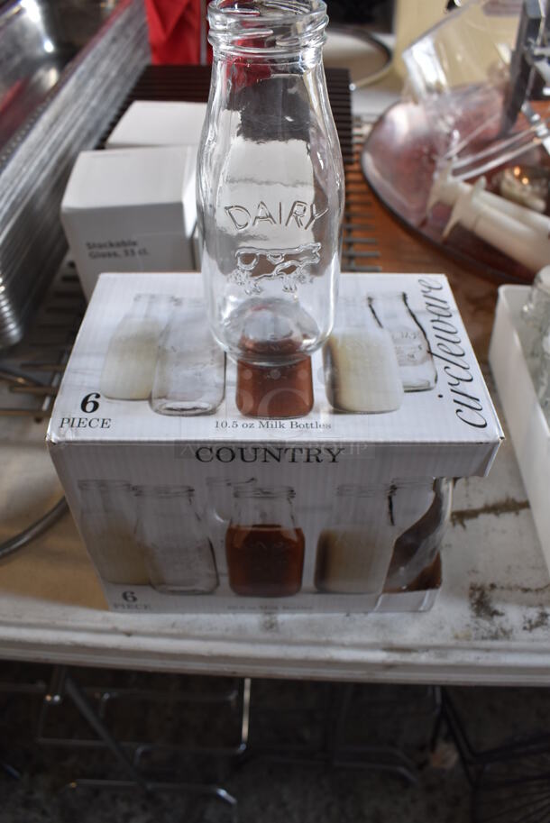 ALL ONE MONEY! Lot of Items on Tabletop Including Metal Bins, Metal Trays, White Poly Trash Can, Tealight Candles, Skillets, Glass Bottles and Glasses - Image 8 of 12