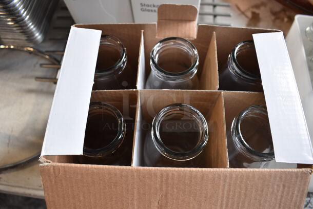 ALL ONE MONEY! Lot of Items on Tabletop Including Metal Bins, Metal Trays, White Poly Trash Can, Tealight Candles, Skillets, Glass Bottles and Glasses - Image 9 of 12