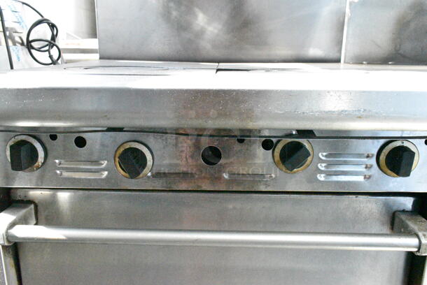 Garland M44T Stainless Steel Commercial Natural Gas Powered Flat Top w/ Oven, Salamander Cheese Melter and Back Splash on Commercial Casters. - Image 7 of 12