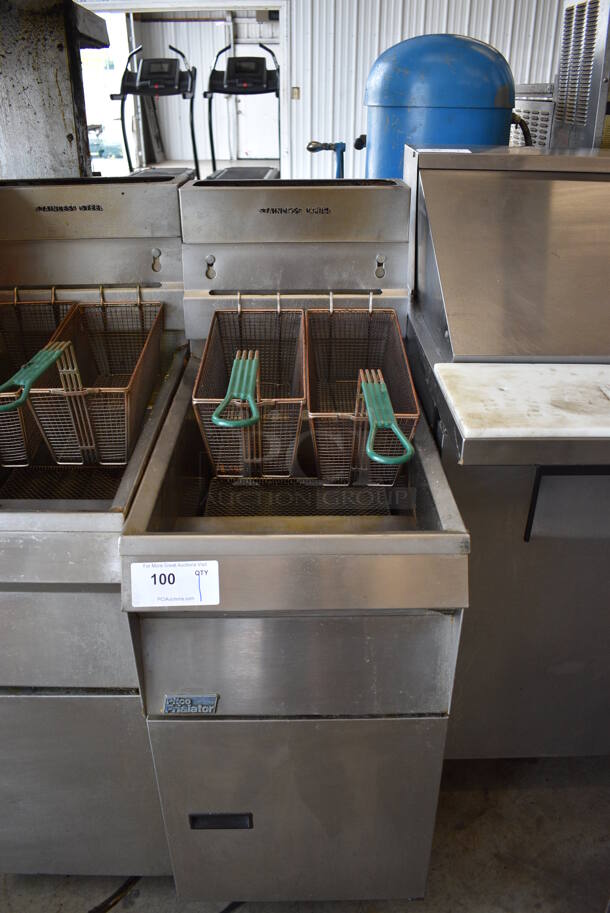 Pitco Frialator Stainless Steel Commercial Floor Style Natural Gas Powered Deep Fat Fryer w/ 2 Metal Fry Baskets on Commercial Casters. 15.5x32x34.5