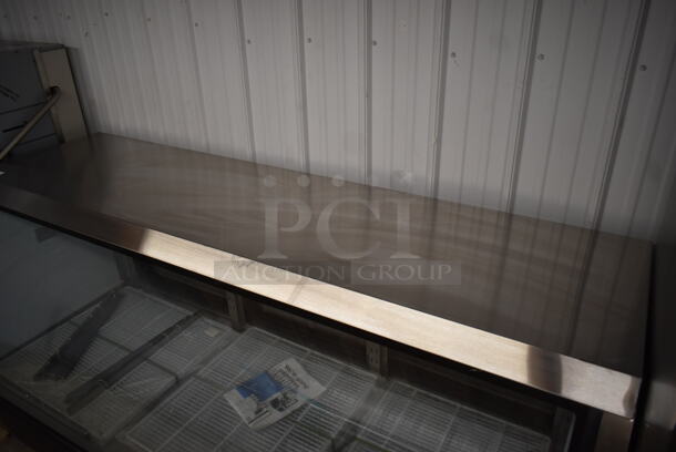 BRAND NEW SCRATCH AND DENT! Avantco 178DLC82HCB Black Metal Floor Style Curved Glass Refrigerated Deli Case. Missing 1 Door, 1 Door Has Glass Damage. 115 Volts, 1 Phase. Tested and Working! - Image 4 of 7