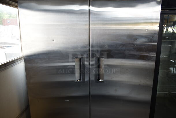 BRAND NEW SCRATCH AND DENT! 2022 Avantco 178A49RHC Stainless Steel Commercial 2 Door Reach In Cooler w/ Poly Coated Racks on Commercial Casters. 115 Volts, 1 Phase. Tested and Working! - Image 3 of 10